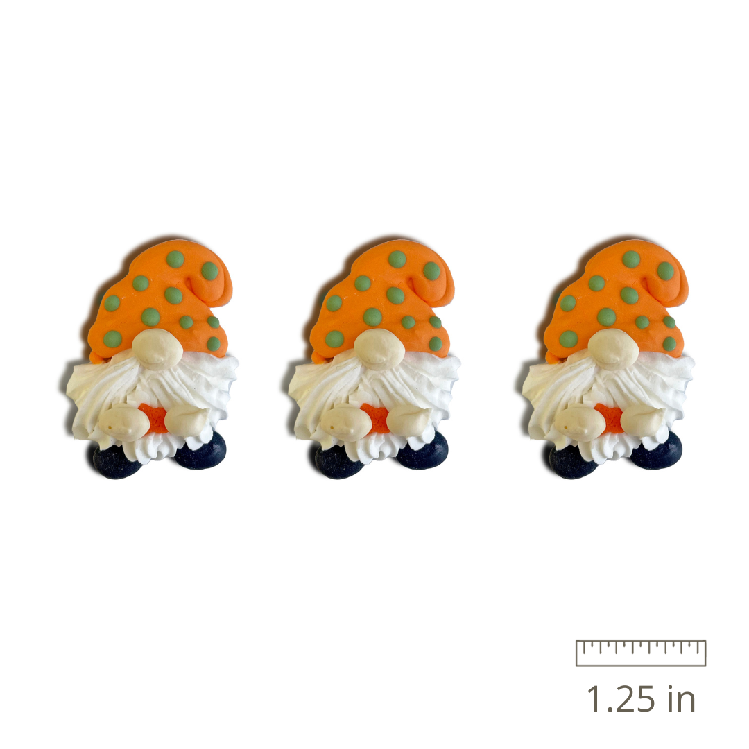 Close-up of Royal Icing Autumn Gnomes - adorable gnomes with orange hats and green dots, perfect for autumn-themed treats.