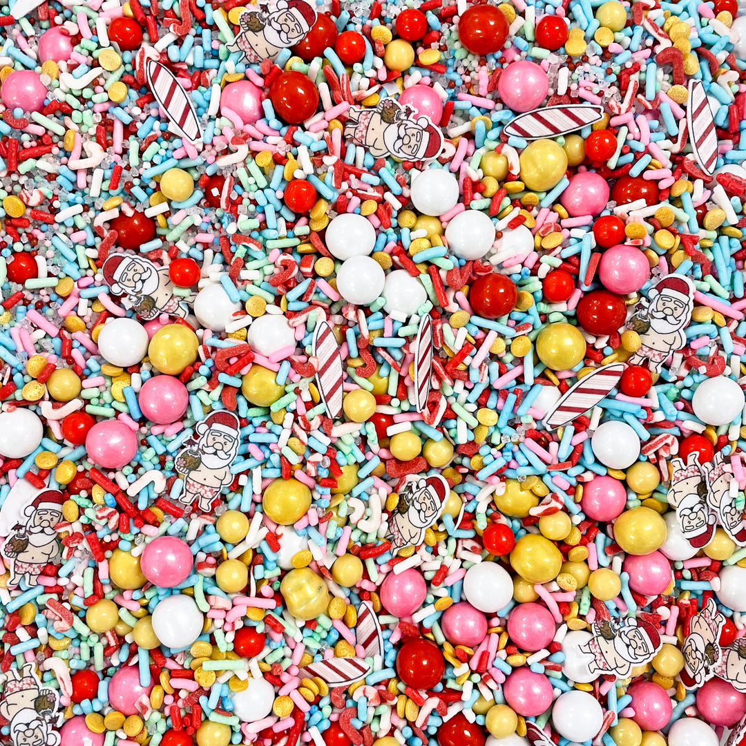 Surfin' Santa Sprinkle Mix - a tropical blend of aqua, pink, red, green, and gold sprinkles to make your desserts shine with summer and Christmas joy.