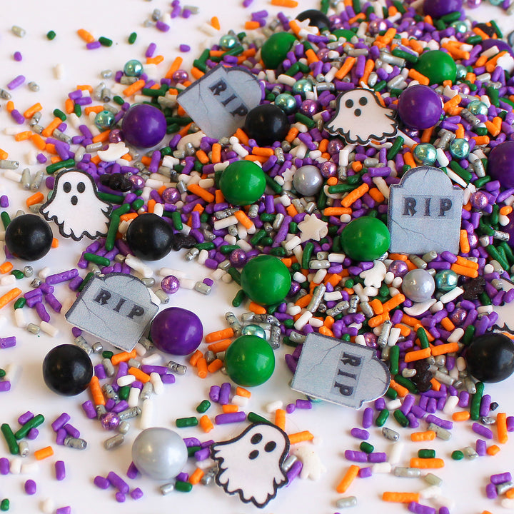 Moonlit Graveyard Sprinkle Mix - Halloween-themed sprinkle mix with orange, purple, green, silver, and black colors, ghost and tombstone shapes