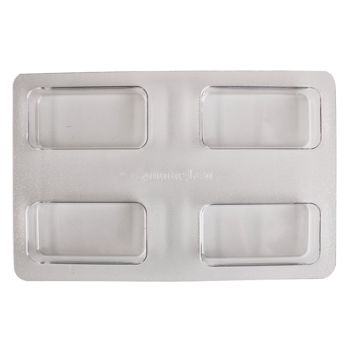A plastic mold with four rectangular indentations, each holding a Biscoff cookie embedded in chocolate.