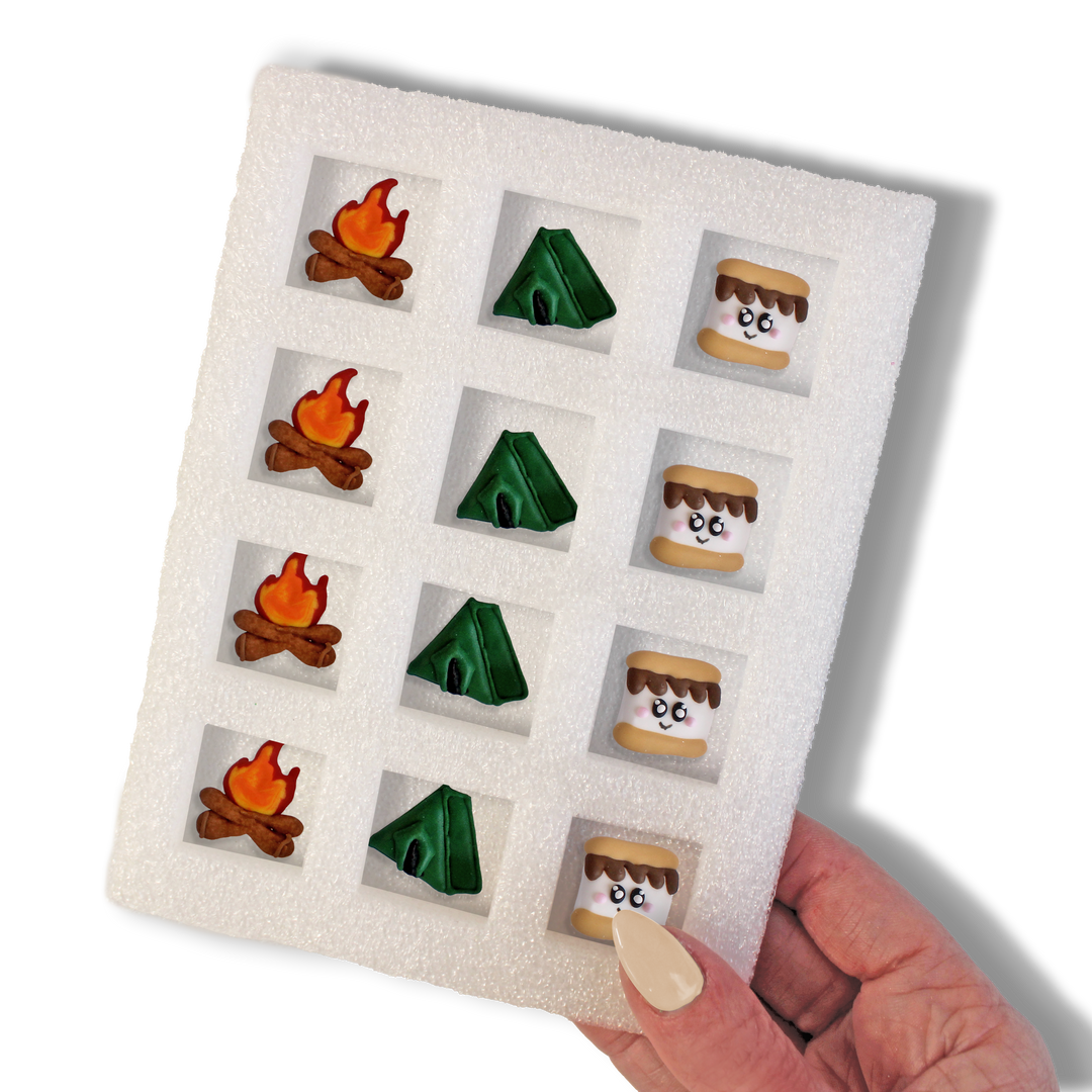 Camping Assortment Royal Icing Decorations - 12 hand-piped decorations featuring Kawaii S'more, Green Tent, and Crackling Fire designs.