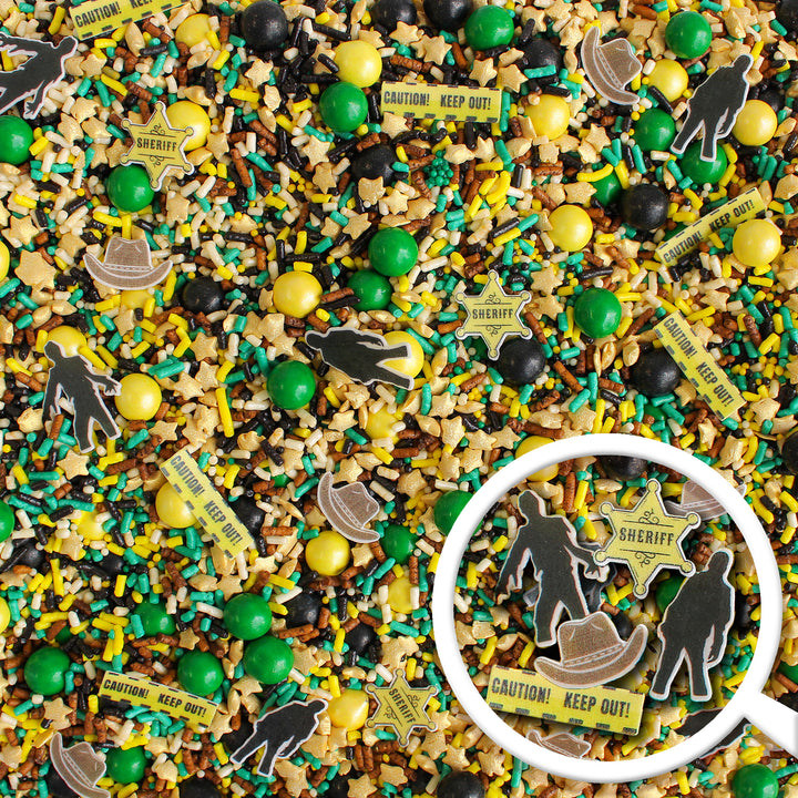 Close-up of Dead Man Walking Sprinkle Mix - a haunting blend of green, yellow, black, and brown sprinkles with wafer zombie silhouettes, sheriff's hat and badge, caution tape, and gold stars.
