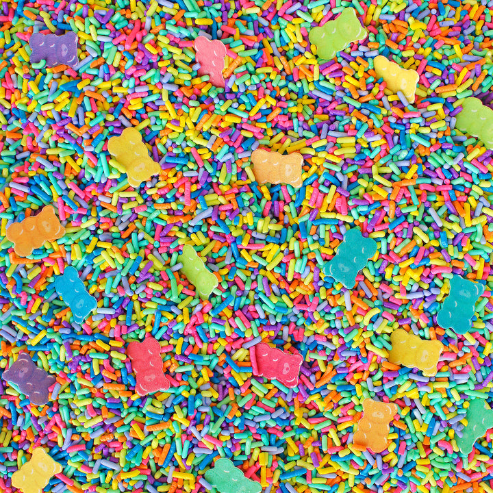 A close-up photo of Gummy Bear Sprinkle Mix with a variety of colorful sprinkles, including specialty wafer gummy bears.