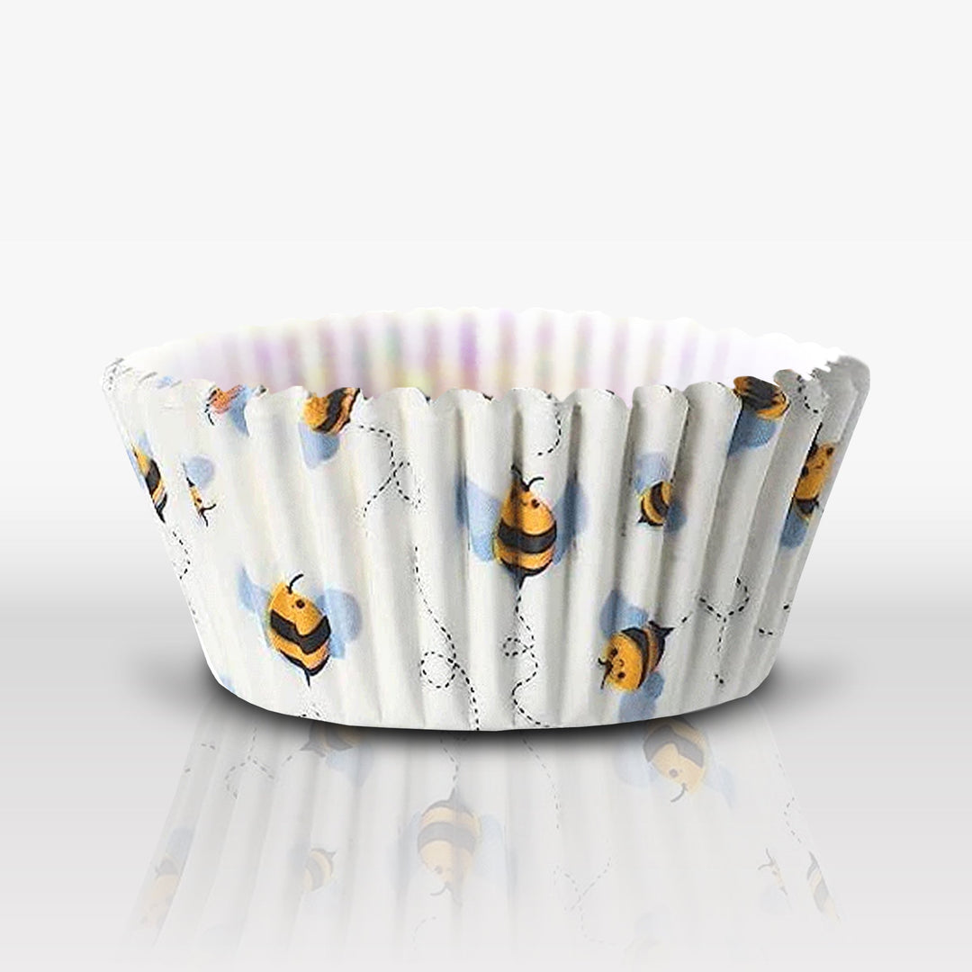 Set of Honey Bee Cupcake Liners featuring yellow and white bee and beehive patterns on a white background.