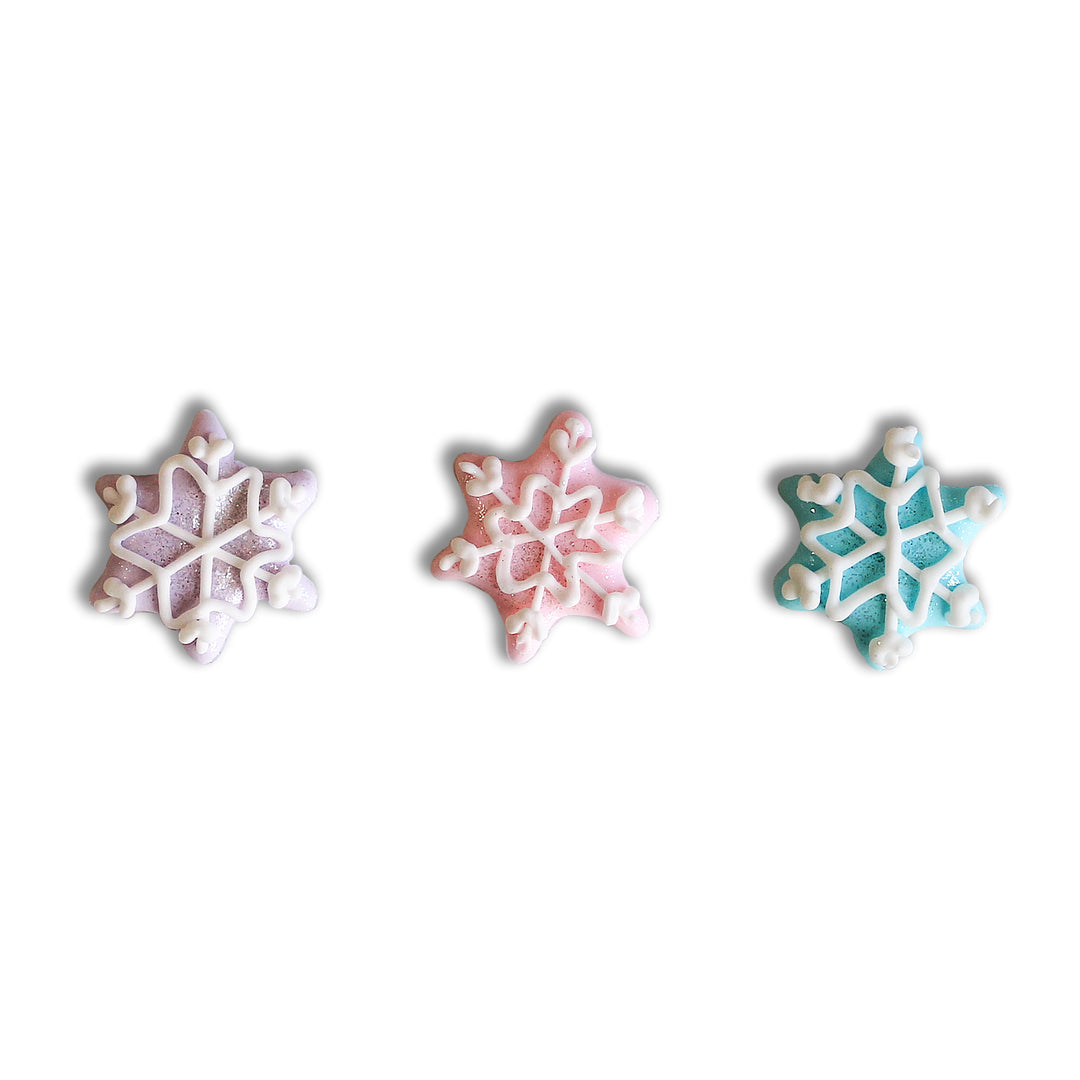 Snowflakes Royal Icing Decorations - A set of 12 hand-piped snowflakes in lavender, pink, and light blue for winter-themed treats.