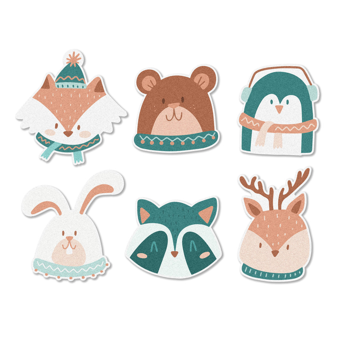 A close-up view of Winter Friends Edible Cupcake Toppers featuring adorable winter animals like foxes, rabbits, raccoons, bears, penguins, and deer.