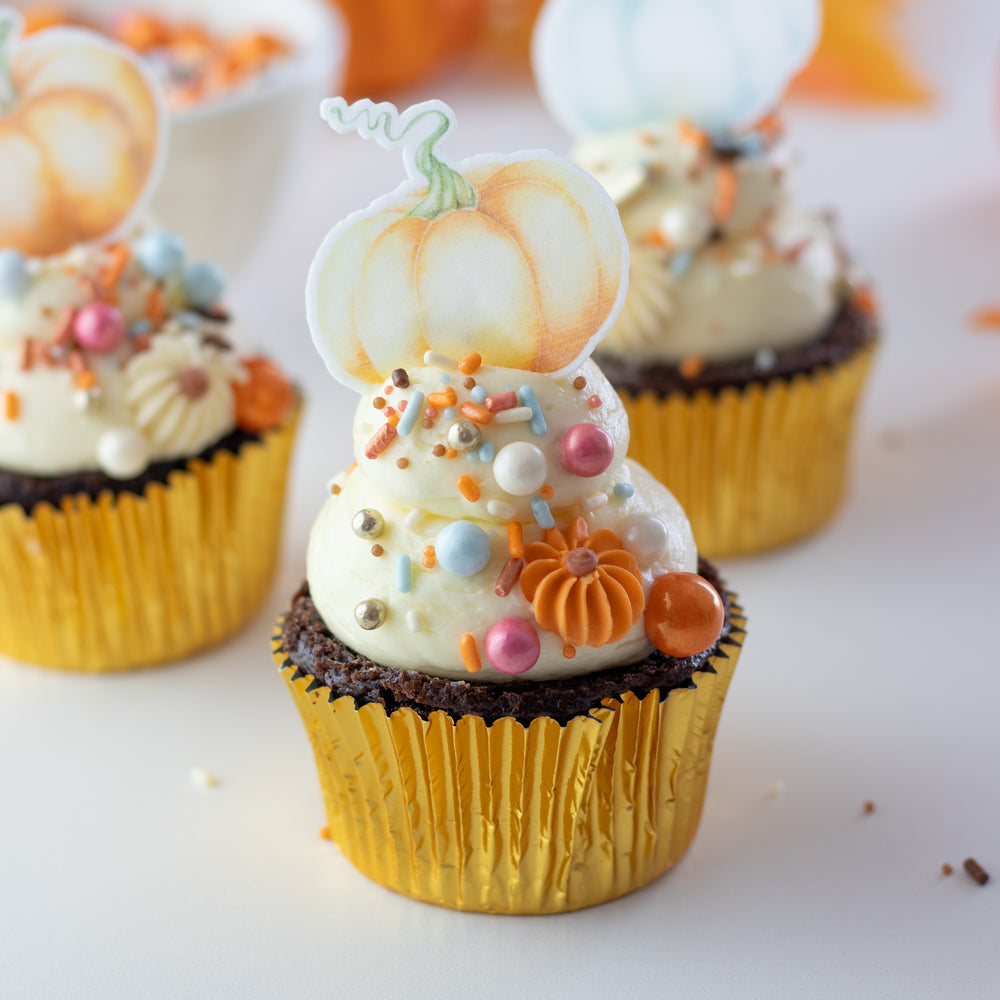 Pumpkin Carriage Sprinkle Mix - a magical blend of colors and hand-piped royal icing pumpkins to enchant your fall desserts.