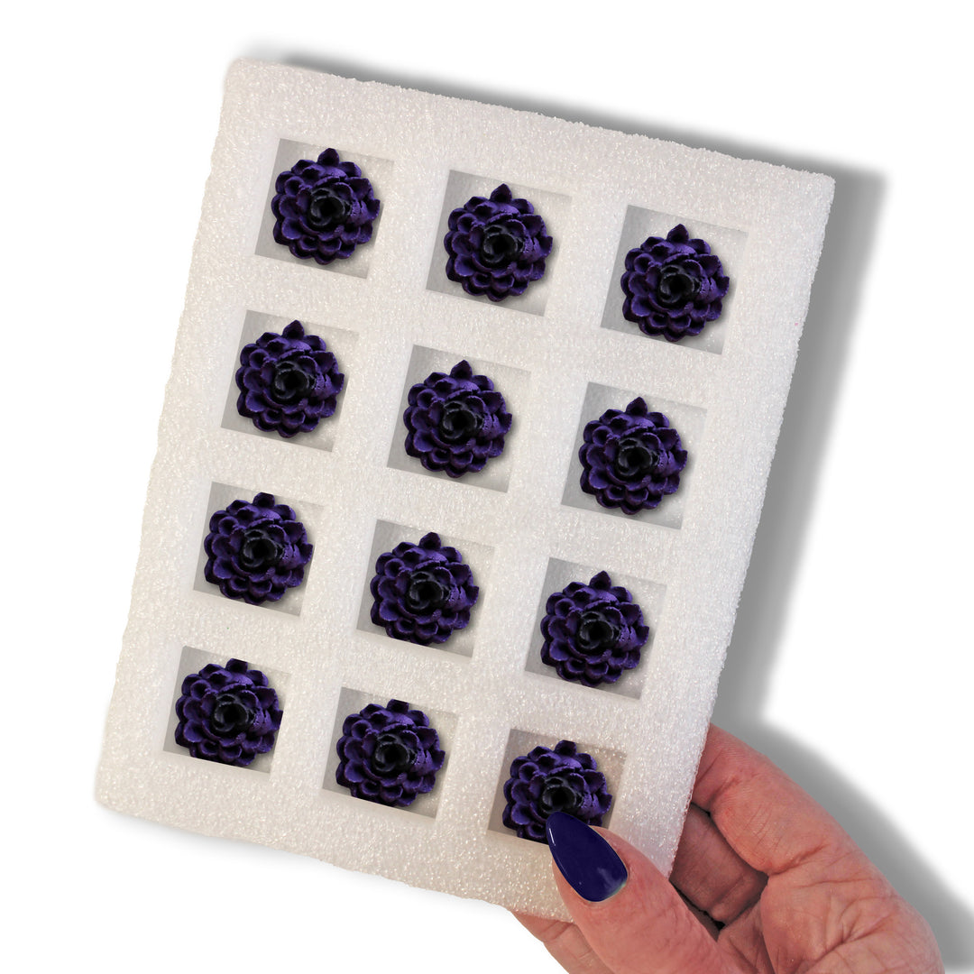 Close-up of Black Dahlia Royal Icing Decorations, beautifully hand-piped black dahlia flowers.