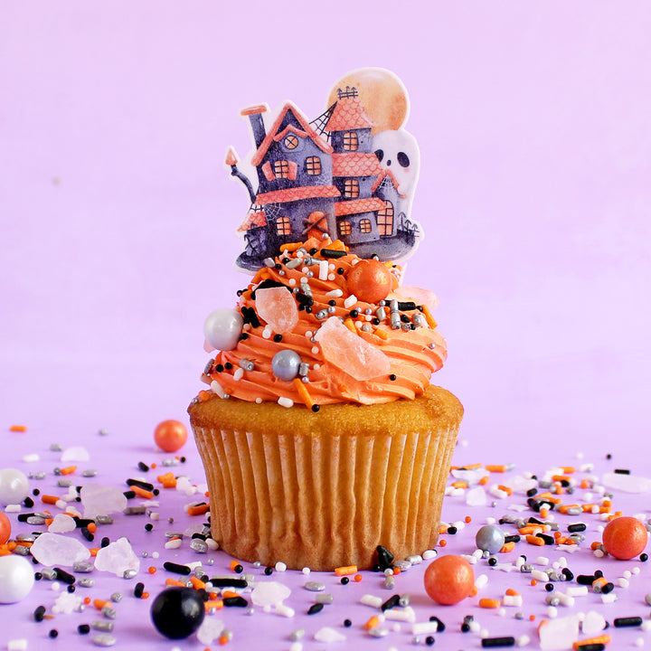 Haunted House Cupcake Kit - a spooky kit featuring A Ghostly Affair Sprinkle Mix, Haunted House Edible Cupcake Toppers, and Metallic Silver cupcake liners for 24 fun and colorful Halloween treats.