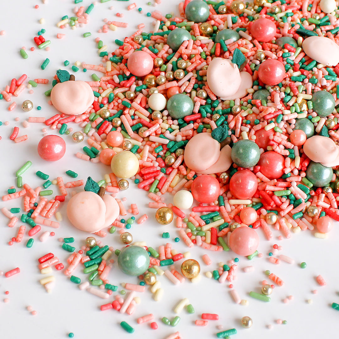 Elevate your baked goods with our Just Peachy Sprinkle Mix. Ideal for decorating cakes, cookies, and cupcakes.
