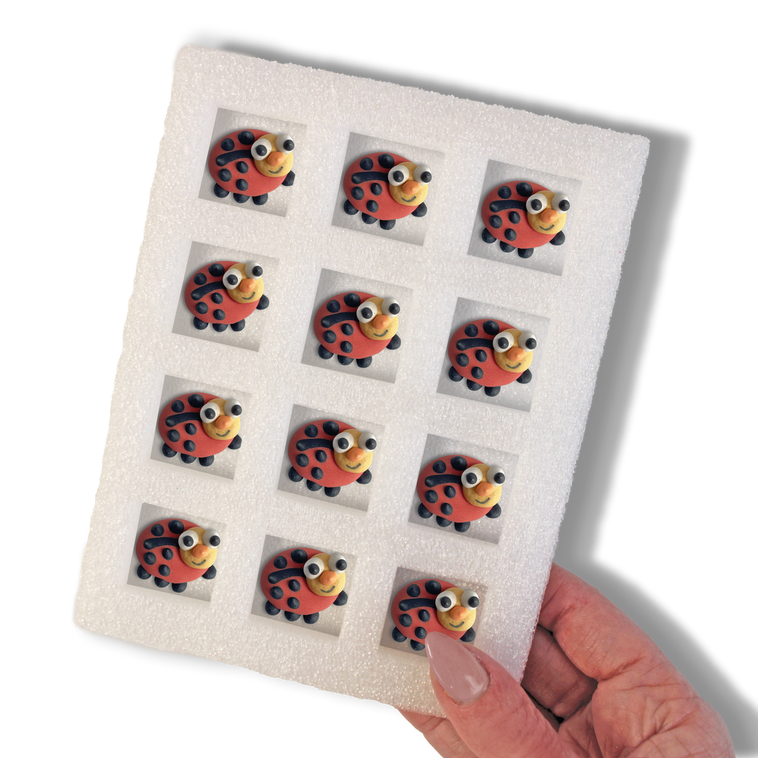 12 hand-piped royal icing lady bugs for decorating cakes and cupcakes