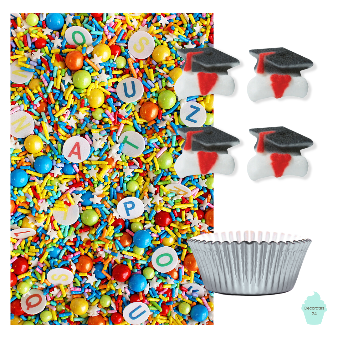 A photo of colorful cupcakes decorated with rainbow sprinkles and Cap & Scroll pressed sugar toppers, with silver cupcake liners. The Little Grads Cupcake Kit can be seen in the background.