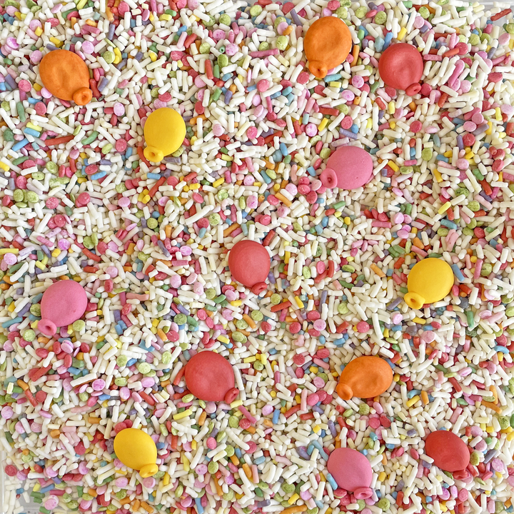 Vibrant natural color sprinkle mix for baking, no artificial dyes, perfect for birthday and rainbow-themed desserts.