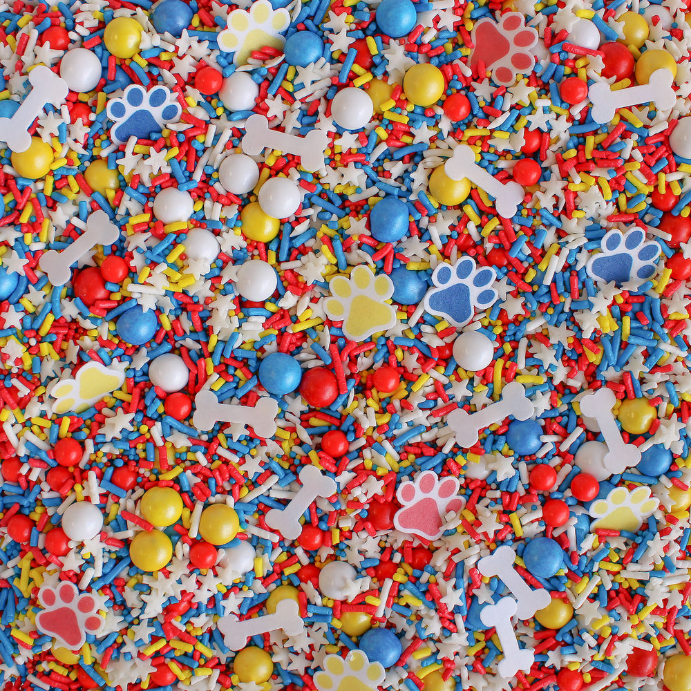 Close-up of Paw Patrol Sprinkle Mix with wafer paw prints and dog bones.