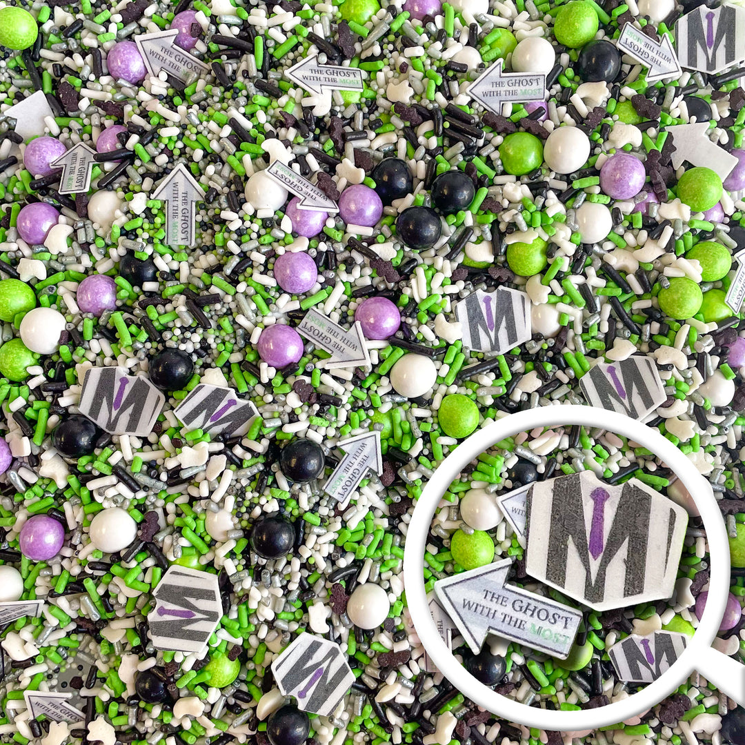 Ghost With The Most Sprinkle Mix with green, black, white, and purple sprinkles, and Beetlejuice-inspired tuxedo wafer pieces.