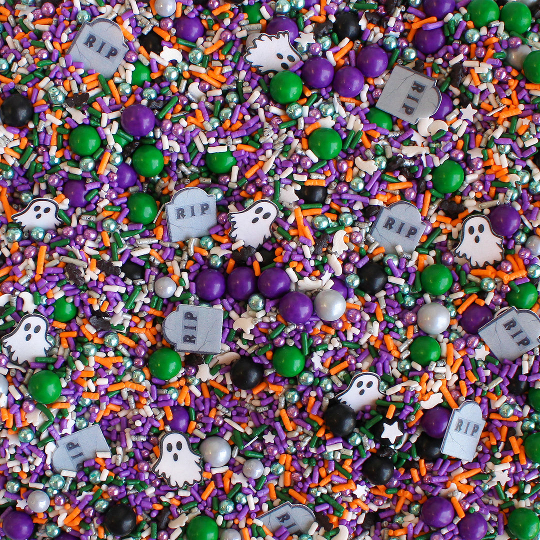 Moonlit Graveyard Sprinkle Mix - Halloween-themed sprinkle mix with orange, purple, green, silver, and black colors, ghost and tombstone shapes