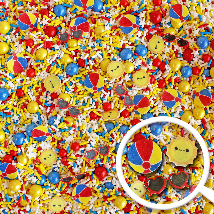 Summer Fun Sprinkle Mix - A vibrant mix of colorful and shaped sprinkles, including wafer beach balls, smiling suns, and sunglasses.