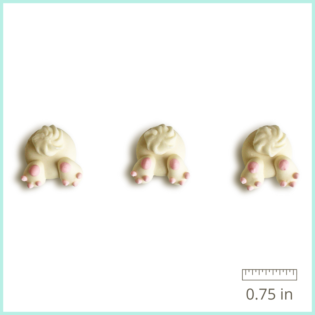 Hand-piped royal icing bunny butts in a set of 12, perfect for Easter and springtime-themed treats.