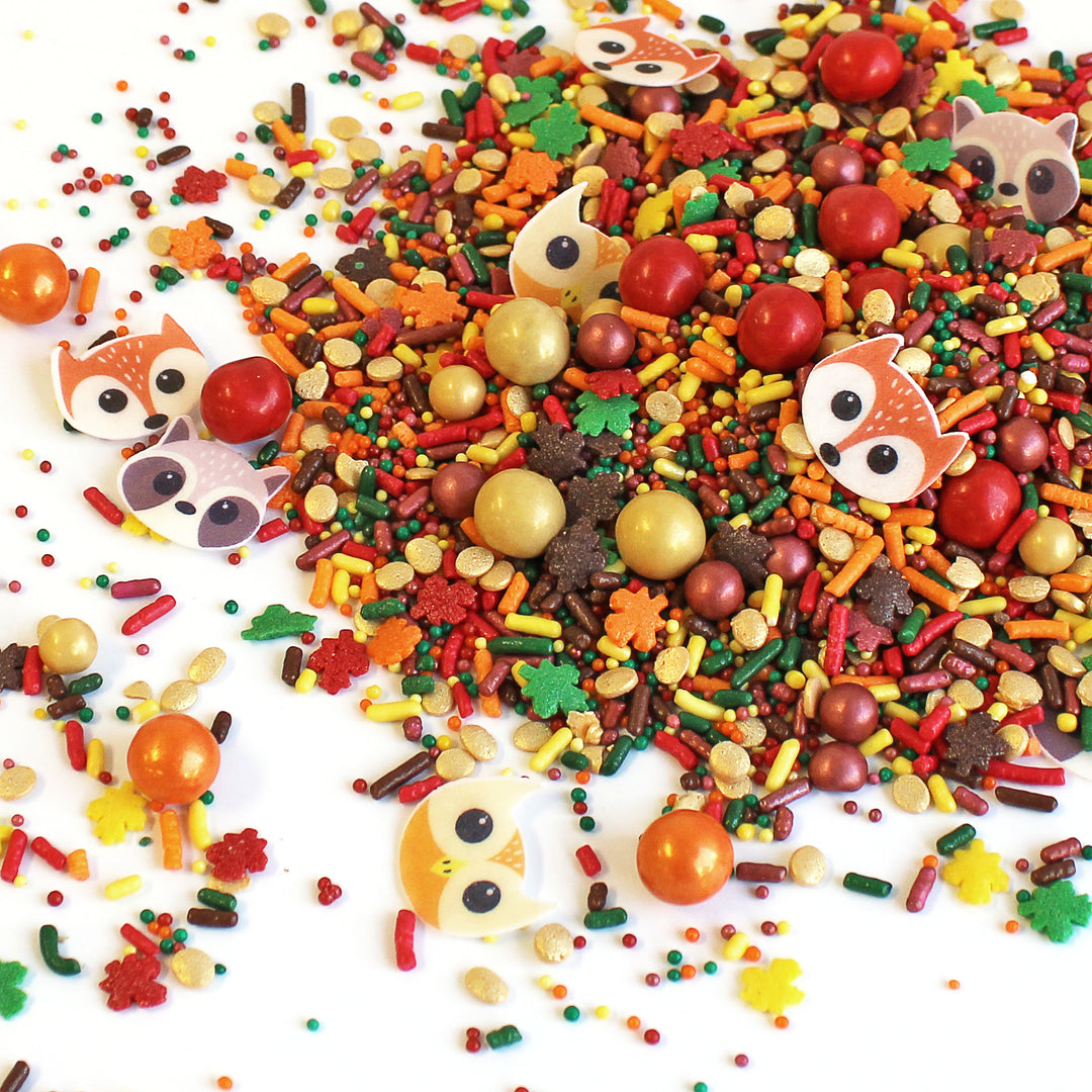 Fall Friends Sprinkle Mix - showcasing the blend of orange, yellow, red, green, and brown sprinkles with wafer foxes, owls, and raccoons.