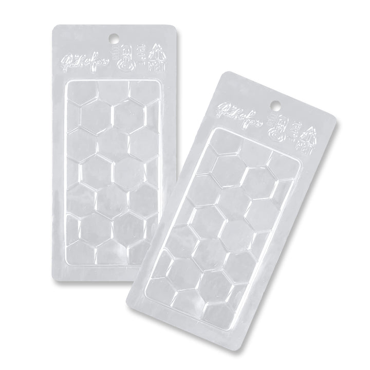 A close-up image of a chocolate mold with honeycomb shapes. The mold is made of silicone and is flexible and durable. The image is perfect for adding to chocolate-making supplies.
