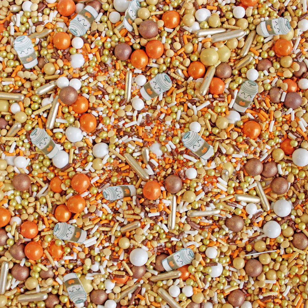 Close-up of PSL Sprinkle Mix - a festive blend of orange, brown, gold, and white, featuring adorable wafer paper PSL cups.