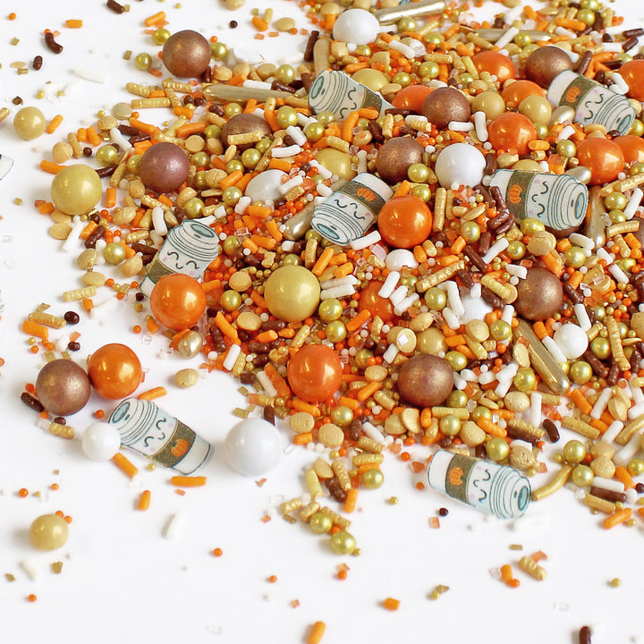 Close-up of PSL Sprinkle Mix - a festive blend of orange, brown, gold, and white, featuring adorable wafer paper PSL cups.